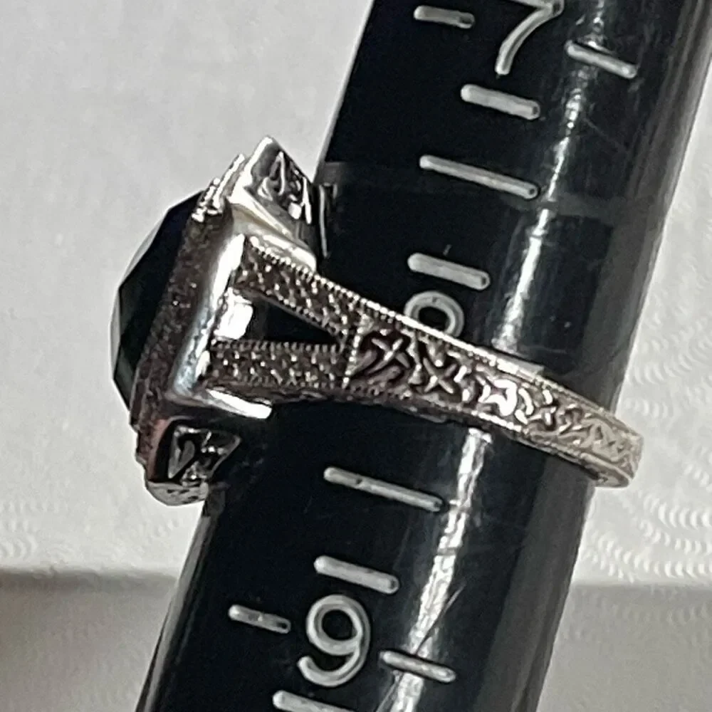 Melanite and white diamond sterling silver size 8 ring.